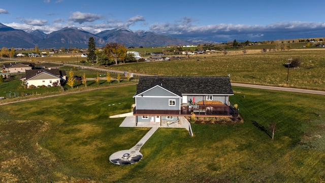 aerial view featuring a rural view and a mountain view