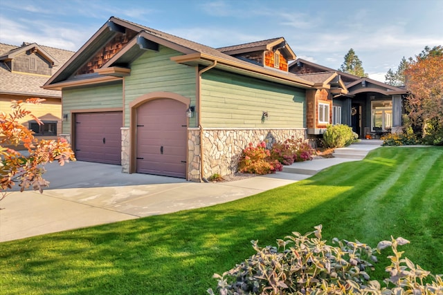 craftsman-style house with a front lawn and a garage