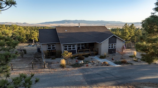 exterior space featuring a mountain view