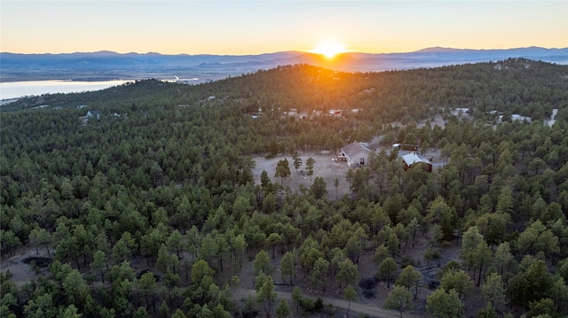 aerial view at dusk with a mountain view