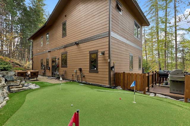 rear view of house with a patio