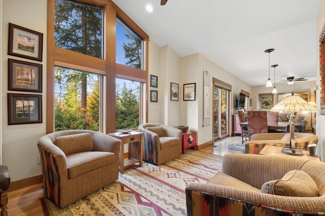 interior space with light hardwood / wood-style floors, plenty of natural light, and ceiling fan