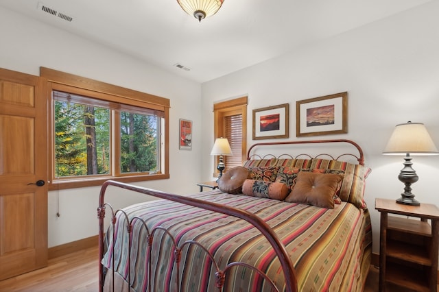 bedroom featuring light wood-type flooring