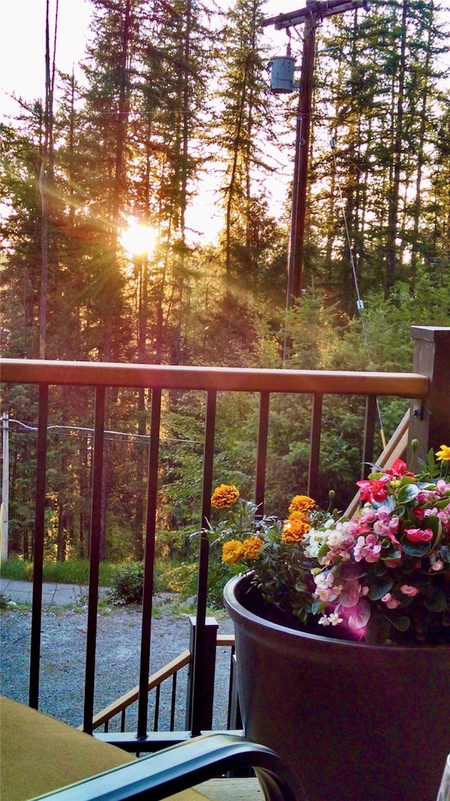 view of balcony at dusk