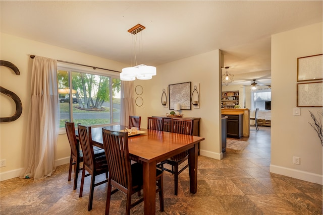 dining space with a chandelier