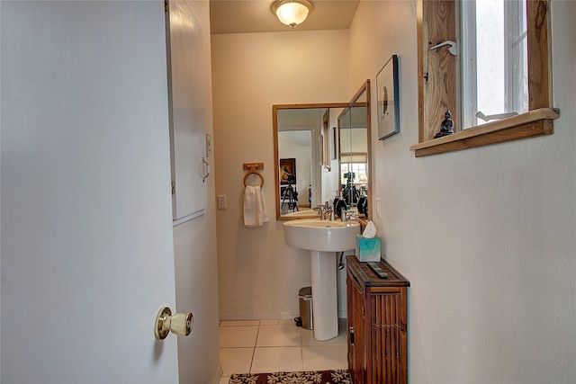 bathroom featuring tile patterned floors and sink