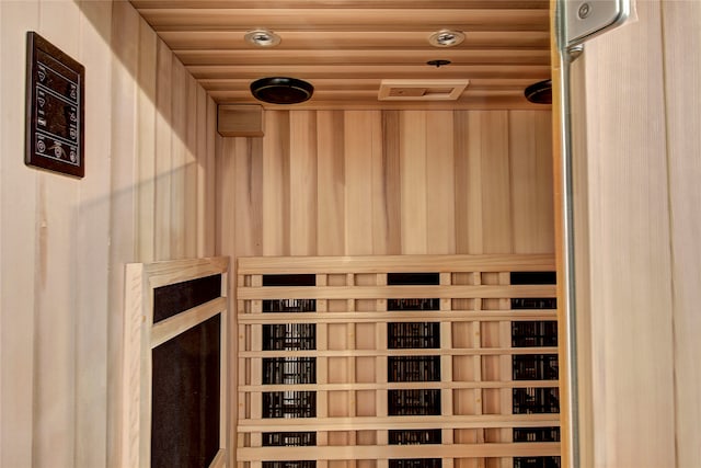 view of sauna featuring wooden ceiling