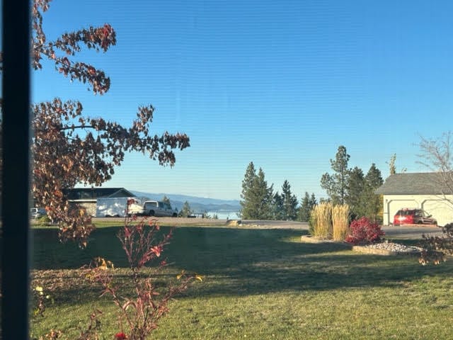 view of yard with a water view