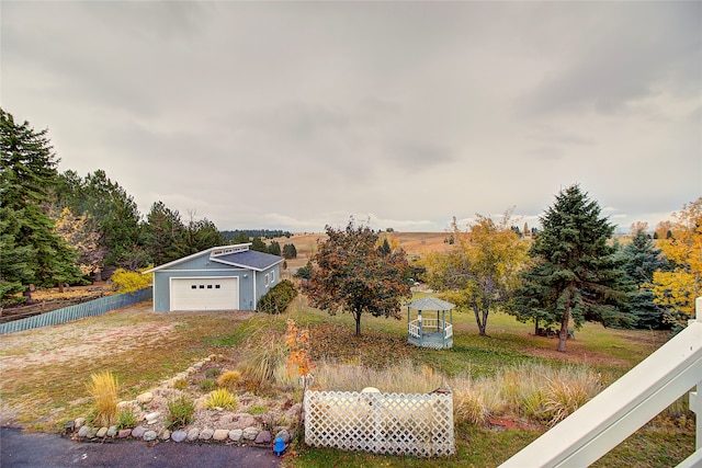 view of yard with a garage