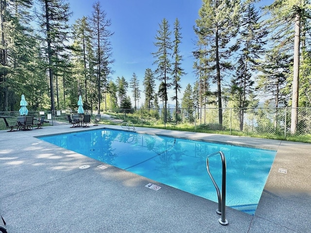 45 Alder Way Unit 3C, Whitefish, MT 59937 - community pool with fence and a patio area