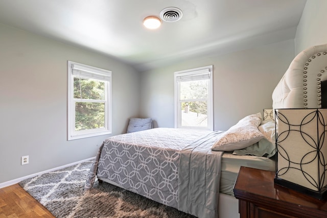 bedroom featuring hardwood / wood-style floors