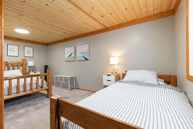 carpeted bedroom with wooden ceiling