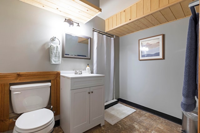 bathroom with toilet and vanity