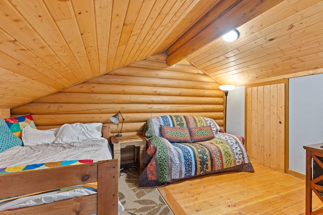 2197 W Tower Rd, Saltese, MT 59867 - bedroom with log walls, wood ceiling, and hardwood / wood-style flooring