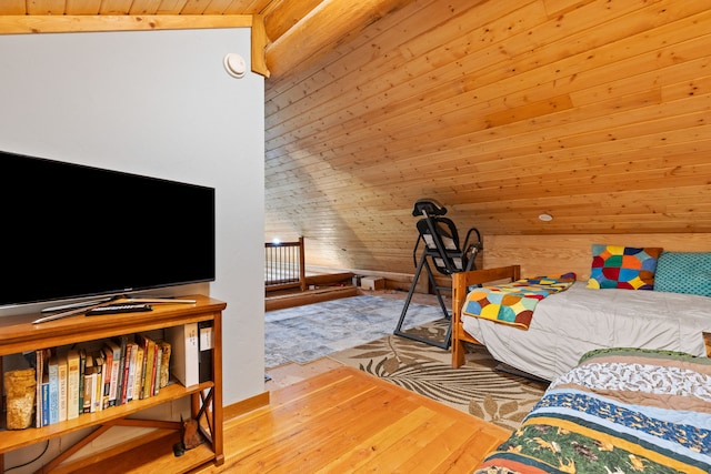 2197 W Tower Rd, Saltese, MT 59867 - bedroom featuring wood finished floors, wood ceiling, and wooden walls