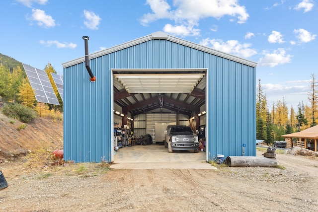 2197 W Tower Rd, Saltese, MT 59867 - view of outdoor structure featuring an outdoor structure and solar panels