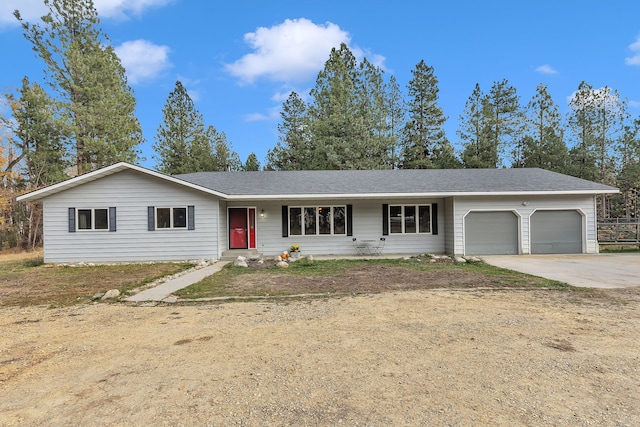 ranch-style house featuring a garage