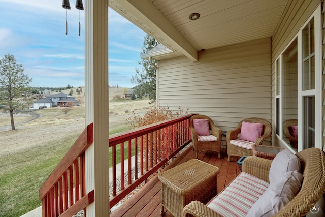 wooden deck with a yard