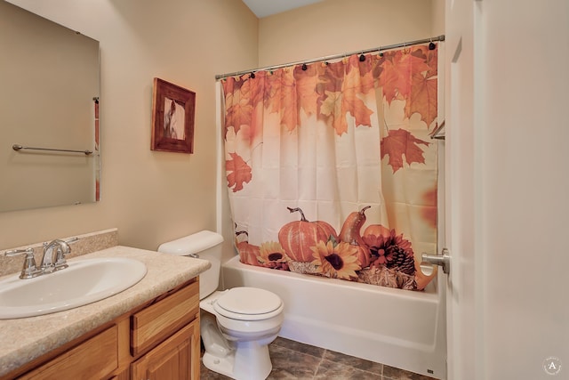 full bathroom with vanity, shower / bath combination with curtain, and toilet