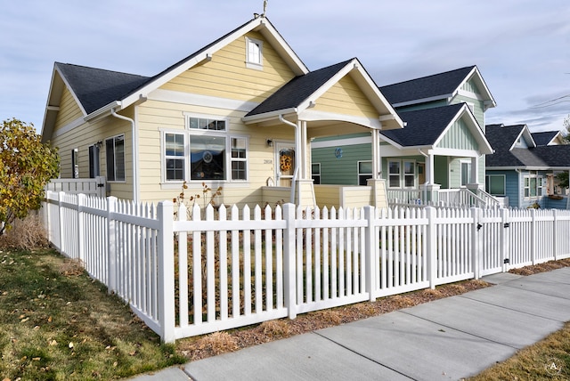 view of front of property featuring covered porch