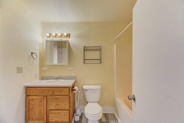 420 Knight St, Helena, MT 59601 - bathroom with toilet, vanity, baseboards, and shower / washtub combination