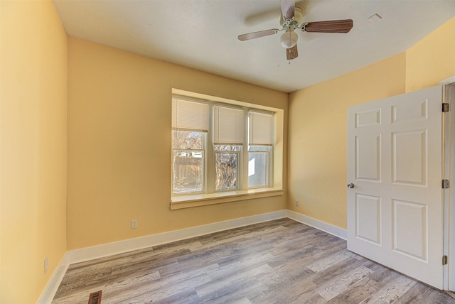 420 Knight St, Helena, MT 59601 - spare room featuring wood finished floors, ceiling fan, and baseboards