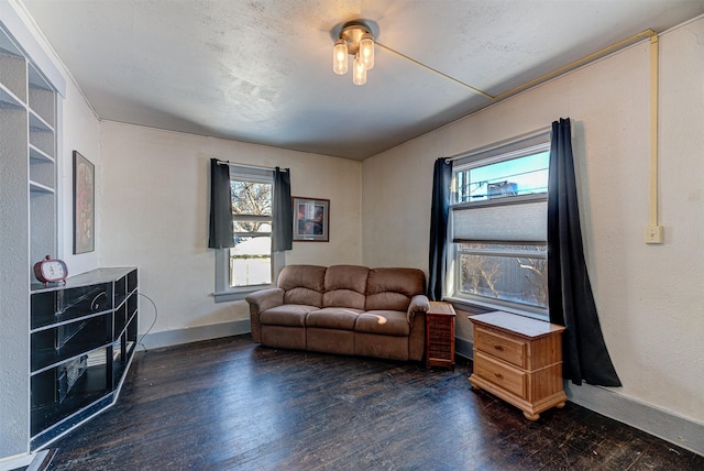 420 Knight St, Helena, MT 59601 - living room featuring dark wood-style flooring and baseboards