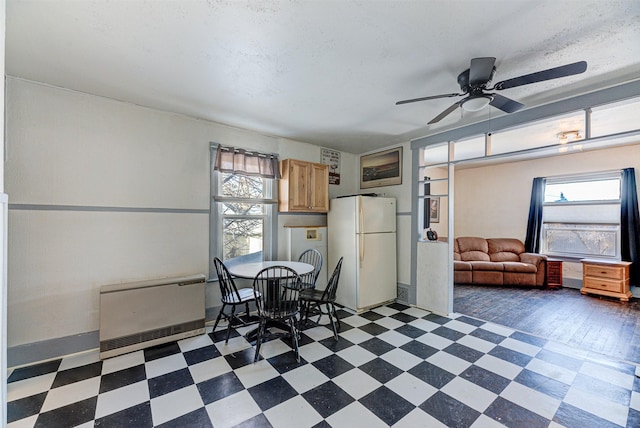 420 Knight St, Helena, MT 59601 - dining room featuring heating unit, tile patterned floors, and ceiling fan