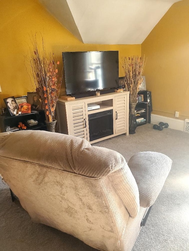 420 Knight St, Helena, MT 59601 - living area featuring carpet floors, lofted ceiling, and a fireplace