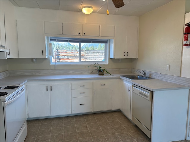 kitchen featuring white cabinets, sink, white appliances, and ceiling fan