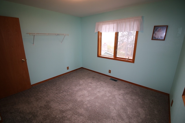 empty room with carpet floors