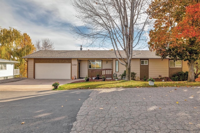 single story home featuring a garage