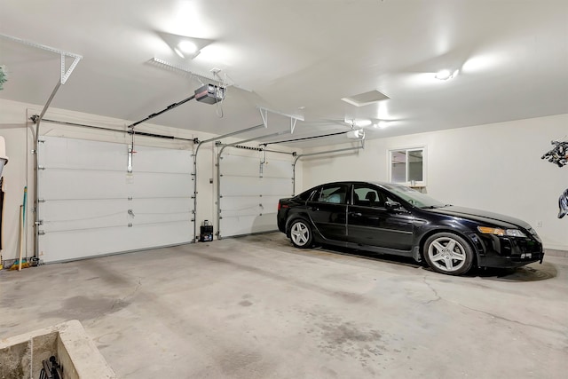 garage featuring a garage door opener