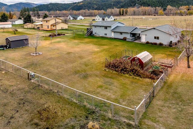 bird's eye view with a mountain view and a rural view