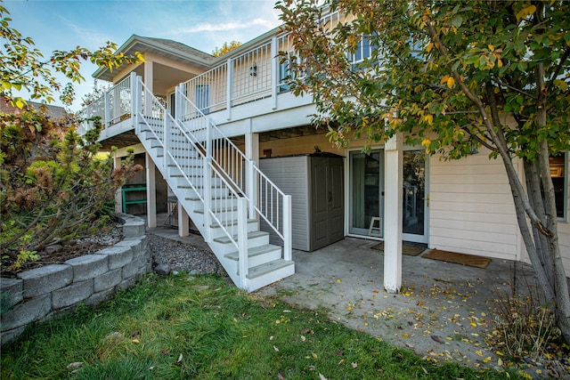 rear view of property featuring a patio