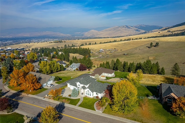 drone / aerial view featuring a mountain view