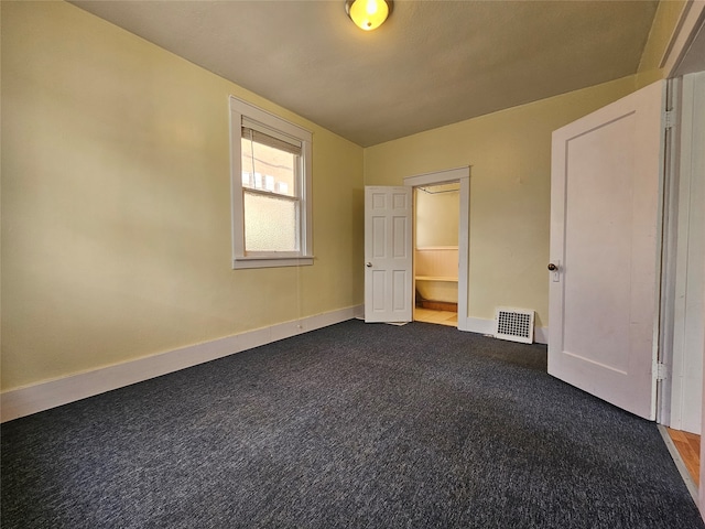 unfurnished bedroom with carpet flooring and a closet