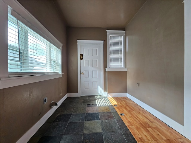 entryway featuring dark wood-type flooring