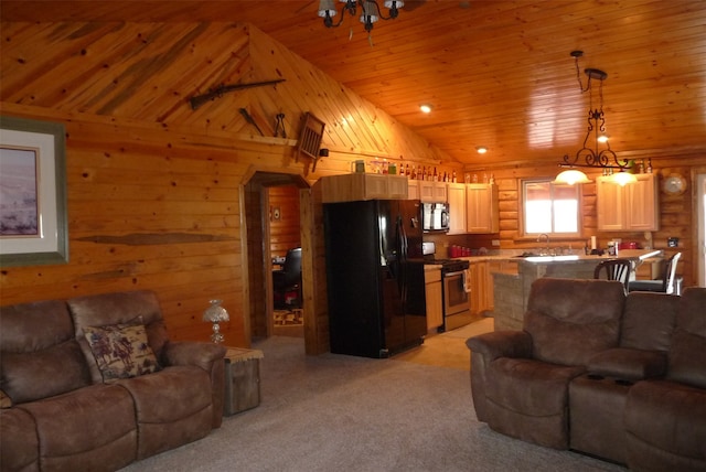 carpeted living room with wood walls, sink, vaulted ceiling, and wooden ceiling