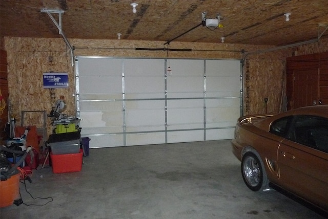 garage featuring a garage door opener