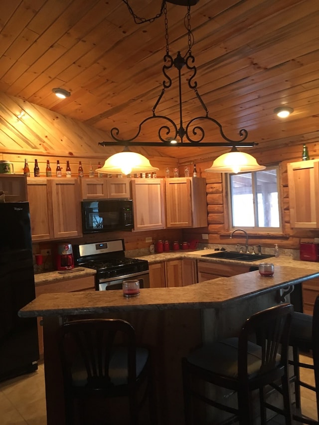 kitchen with a kitchen bar, wood ceiling, sink, and black appliances