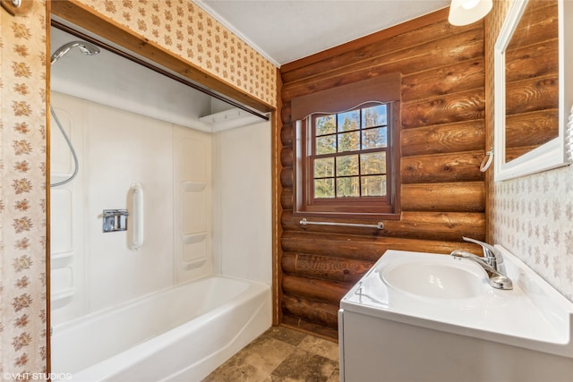 bathroom featuring vanity, rustic walls, and bathing tub / shower combination