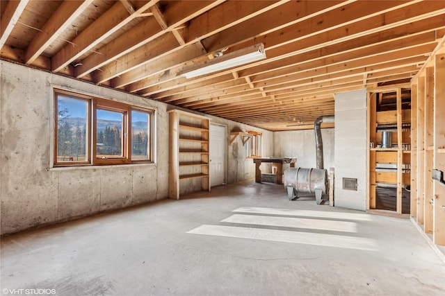 basement with a wood stove