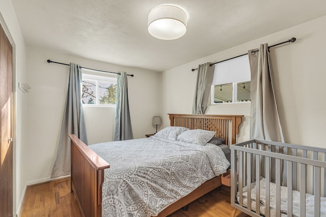 bedroom featuring hardwood / wood-style floors