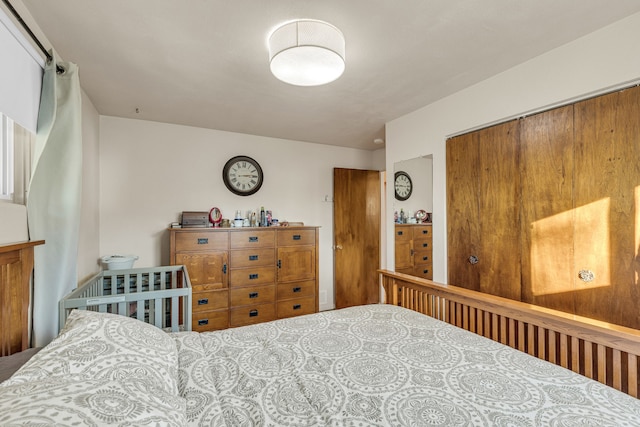 bedroom with a closet and carpet flooring