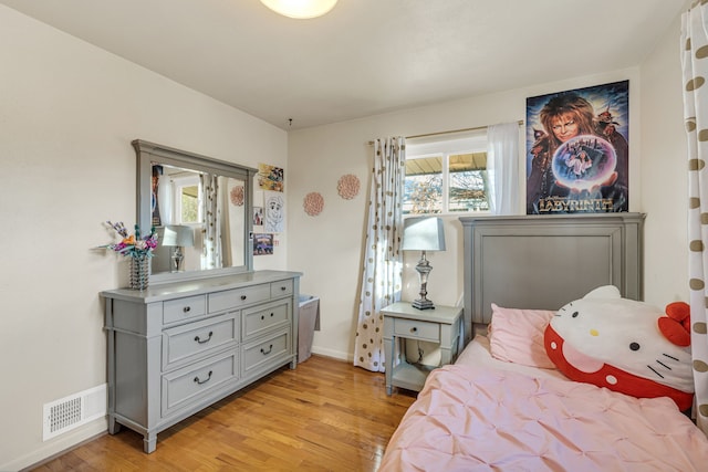 bedroom featuring light wood-type flooring