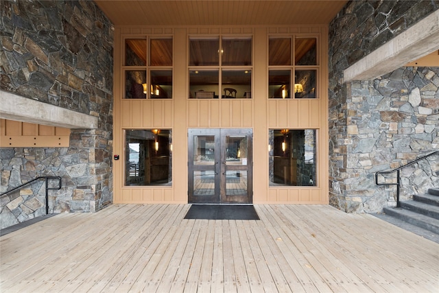 doorway to property featuring a deck and french doors