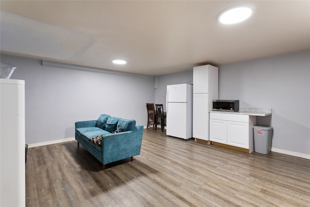 living room featuring wood-type flooring