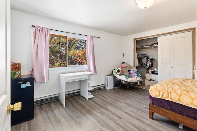 bedroom featuring a closet and hardwood / wood-style flooring