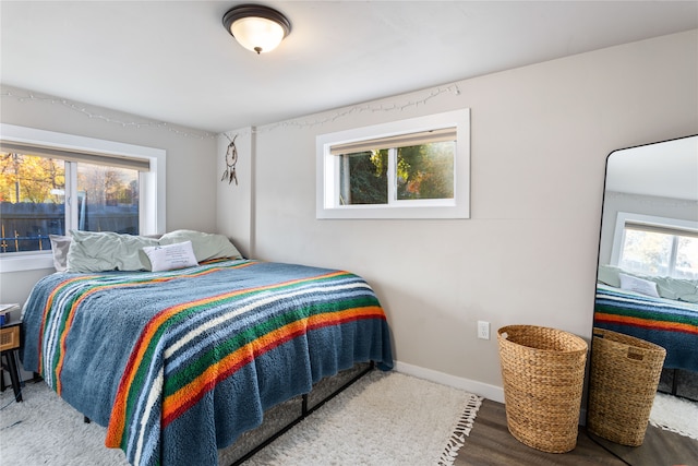 bedroom featuring multiple windows